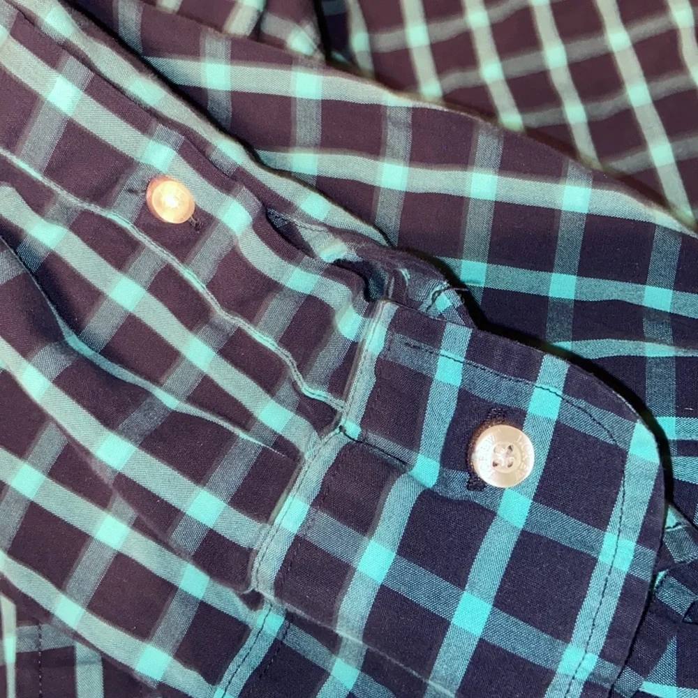 J. Crew button down long sleeved teal and black button downed shirt